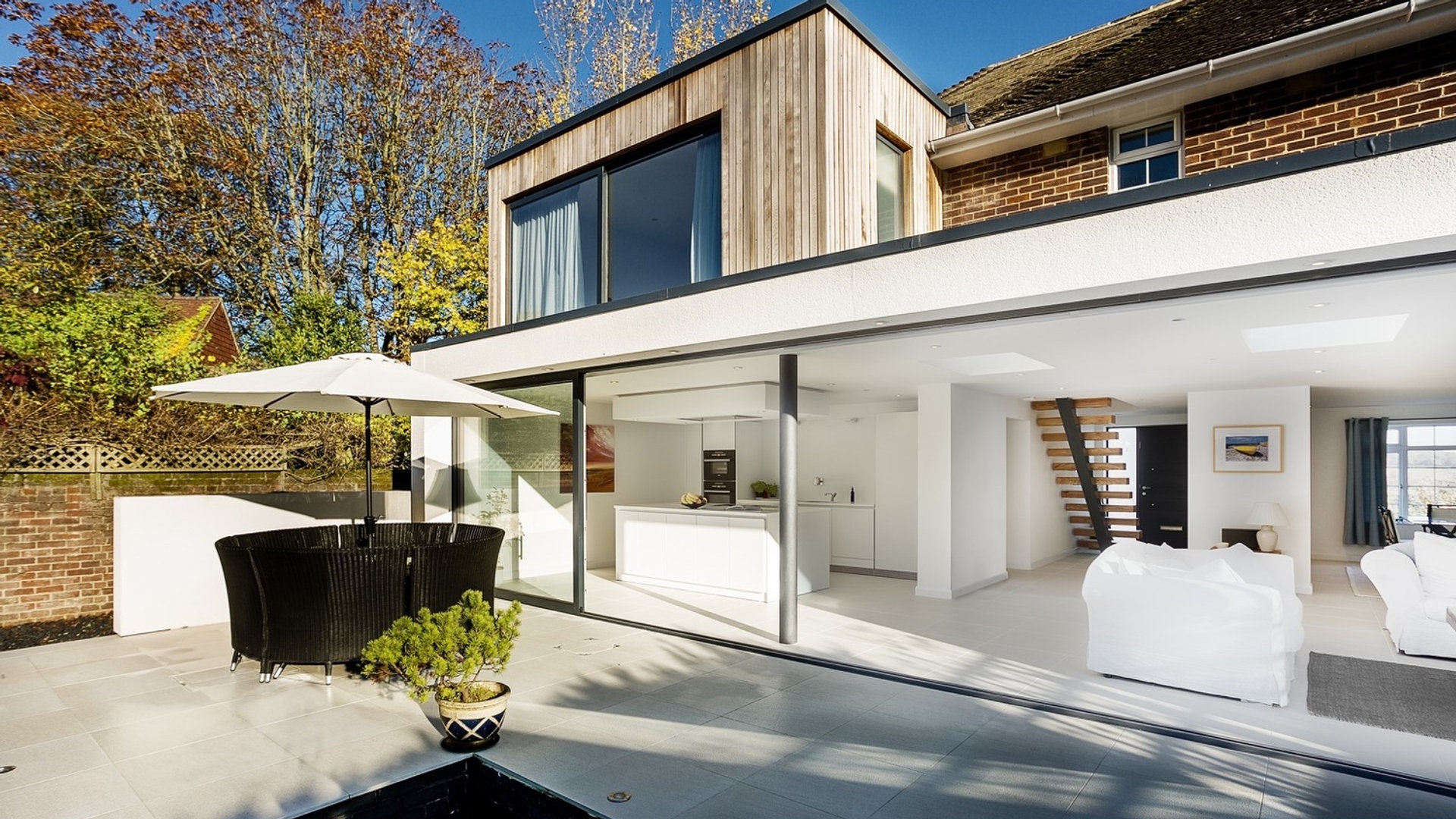 Modern rear extension with cedar cladding and open-plan living space